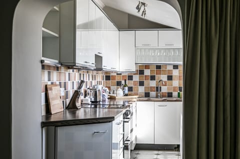 Fridge, electric kettle, toaster, cookware/dishes/utensils