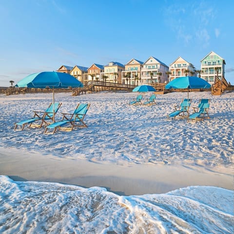 Enjoy beach chair and umbrella service and more on the resort’s 580 feet of sugar-white beachfront.
