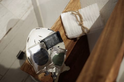 Biancorotto | Bathroom | Shower, rainfall showerhead, designer toiletries, hair dryer