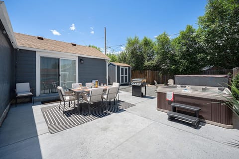 Soak up the season with a tub and patio made for relaxing.