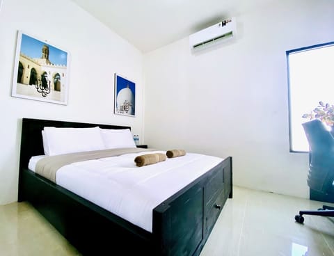 Pillowtop beds, desk, laptop workspace, free WiFi
