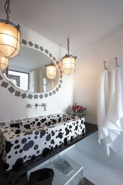 Luxury Quadruple Room | Bathroom | Rainfall showerhead, designer toiletries, hair dryer, bathrobes