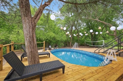 Whether you prefer to lounge poolside and work on your tan or take a refreshing plunge, this backyard deck is a place of entertainment and relaxation!