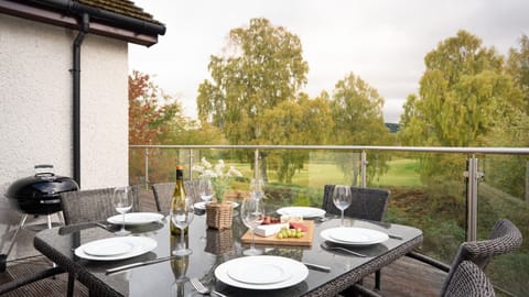 Coorie Lodge patio and table set for bbq