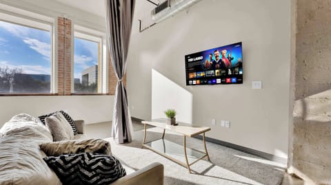 Bright space with industrial charm, chic decor, and stunning views await your stay