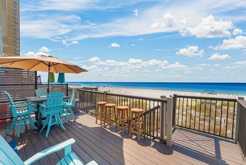 Walk straight onto the sand from this beachfront townhome — no elevators, no busy streets, just direct Gulf access.