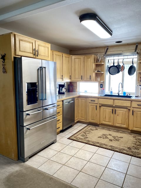 The well appointed kitchen features modern appliances...
