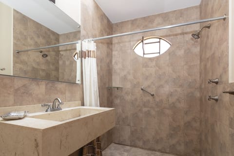 Superior Room | Bathroom | Shower, hair dryer, towels, soap