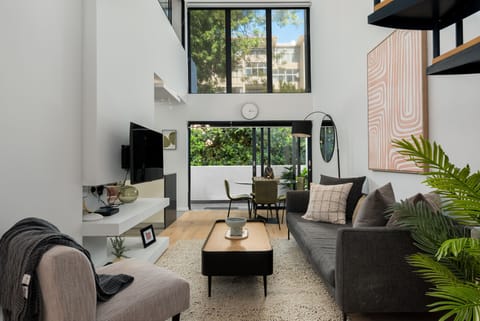 Exclusive Apartment | Living area | 50-inch flat-screen TV with cable channels, TV, Netflix