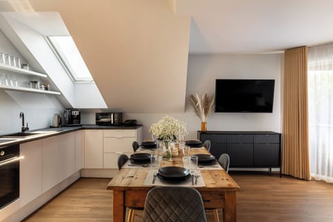 Comfort Apartment | Private kitchen | Full-size fridge, oven, stovetop, dishwasher
