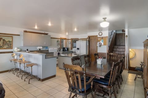Open concept kitchen, dining, and living areas perfect for gathering with family 