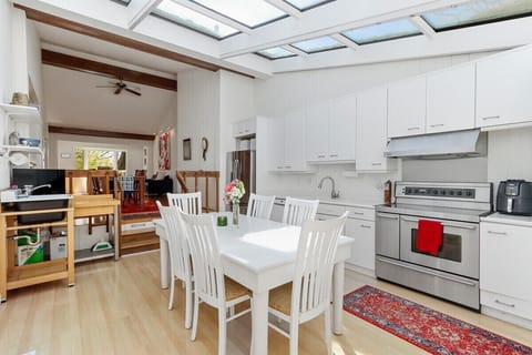 Kitchen area to dining room (two steps down required)