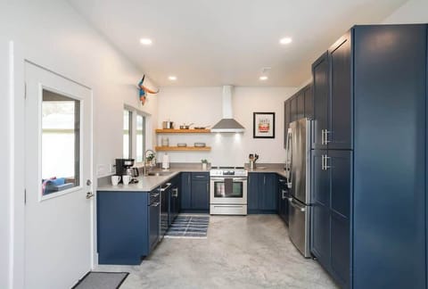 ADA-friendly main living space delights with easy kitchen access.