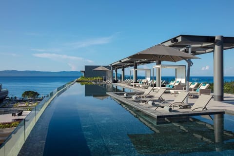 On the beach, sun loungers, beach towels