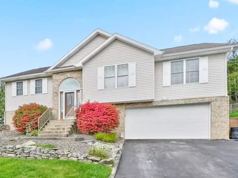 Enjoy this high-ranch home with 2000 sqft of living space.