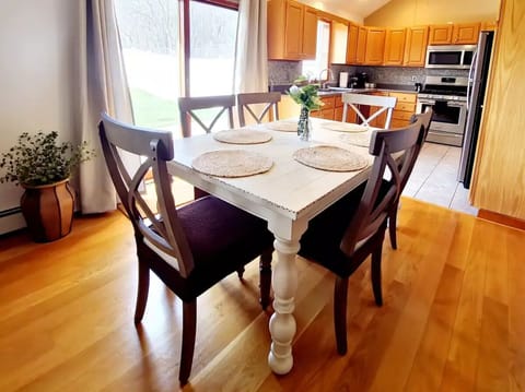 The slider off the dining area opens up to a private patio and backyard.