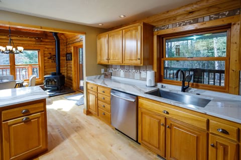 Kitchen includes appliances, utensils, cookware, and more