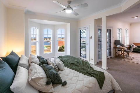 Master Bedroom 
koala King bed with soul mate mattress
Reverse cycle heating & cooling 
Electric blanket
Ceiling fan 
Ensuite with spa
1500 thread count sheets
Pillow menu
Adjacent parents retreat 
Dedicated workspace