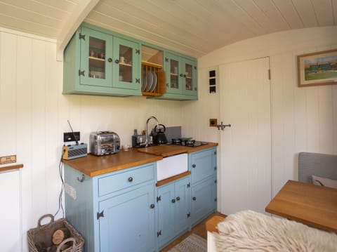 Fridge, electric kettle, toaster, cookware/dishes/utensils