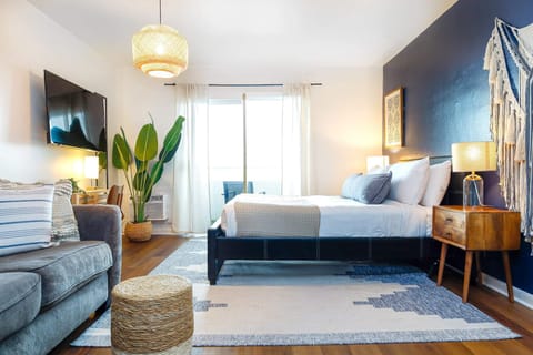 Relax in our stylish living room, a cozy spot that perfectly captures the essence of Miami living.