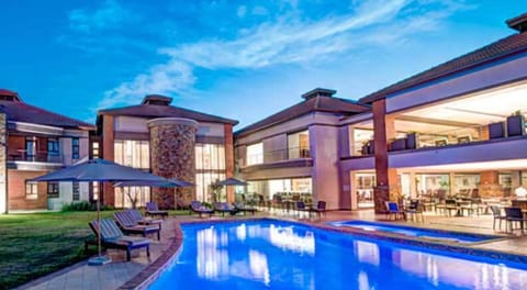 2 outdoor pools, pool umbrellas, sun loungers