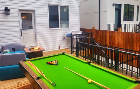 Beautiful slate pool table, gas grill, and fire place in a fully fenced yard 