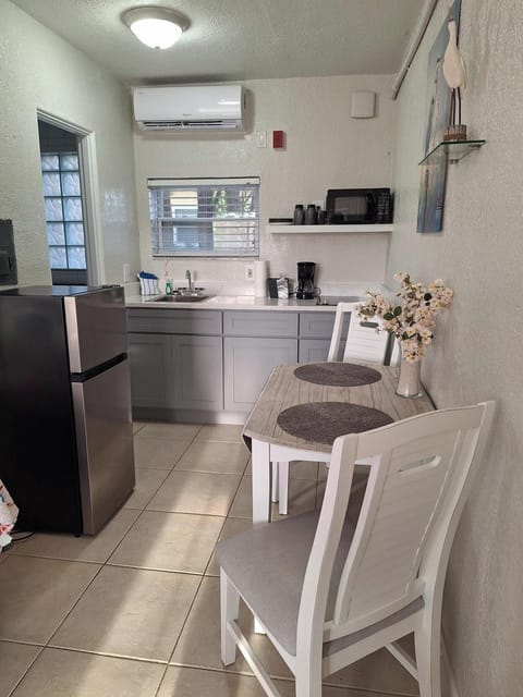 Double Room, 2 Queen Beds, Kitchenette | Private kitchen | Mini-fridge, microwave, cookware/dishes/utensils, paper towels