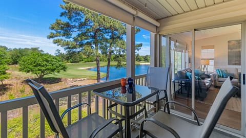 Screened balcony with golf course view