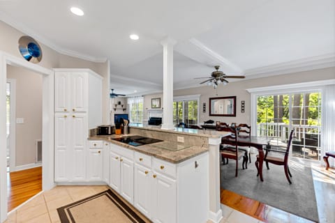 The kitchen is open to the dining area