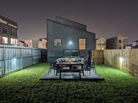 Back Yard- entertainment area at night time, outside dinning, bbq