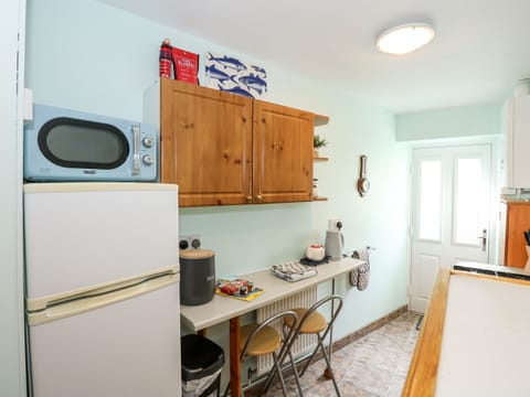 Fridge, electric kettle, toaster, cookware/dishes/utensils