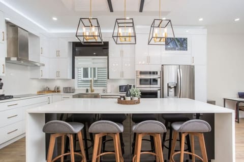 Beautifully designed kitchen equipped with modern appliances, including a stove that’s turned off for your safety, as we also offer a fully functional spice kitchen for all your cooking needs.