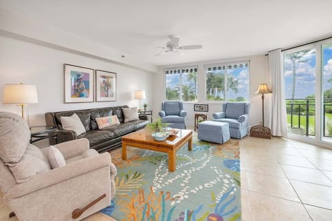 North Breakers 211 - Living room with ocean view and patio access