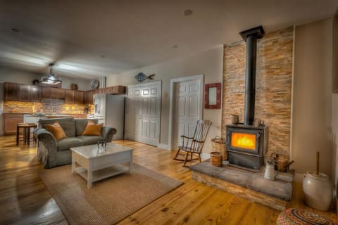 Living room with wood burning fireplace