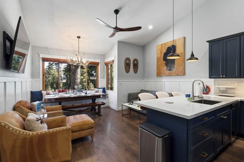 Relax in this elegant open-concept space where your kitchen flows into cozy living and dining areas, perfect for gathering with loved ones.