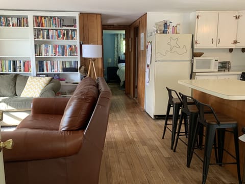View from entrance through open living space to bedrooms.