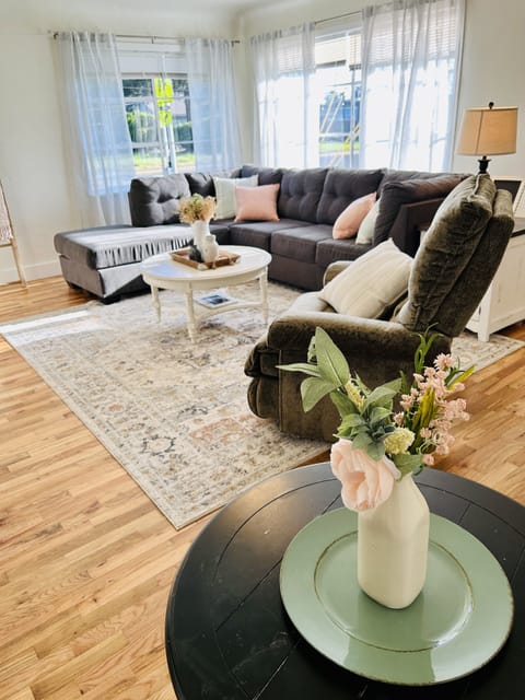 Warm and inviting living room with comfortable sectional and chair.