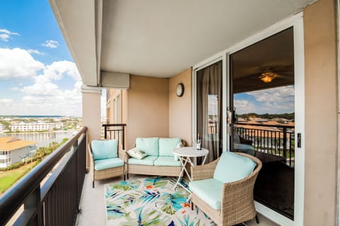 Unwind on your private balcony with soft seating and sweeping views—perfect for morning coffee or evening relaxation.
