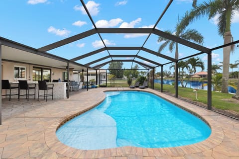 Sit in the pool, on the dock or at the bar while watching boats along the water.