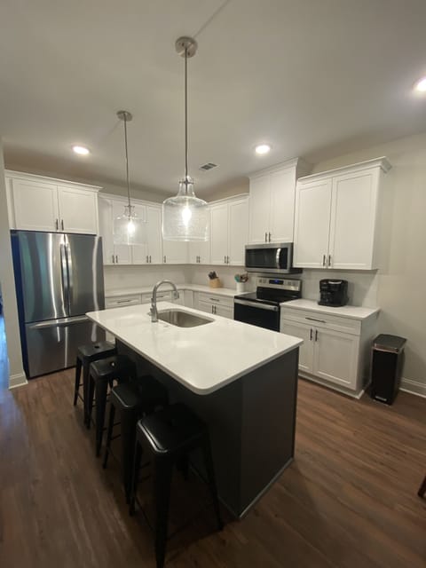 Well stocked kitchen. Seating for 4 at island.