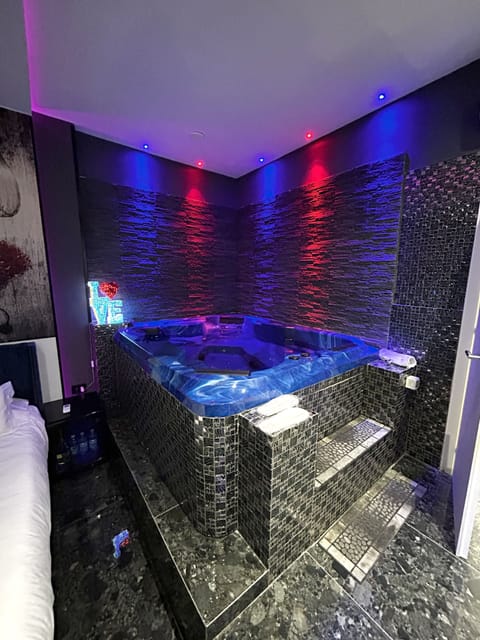 Club Room | Premium bedding, down comforters, memory foam beds