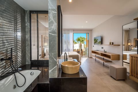 Room, Jetted Tub, Garden View | Bathroom | Bathtub, free toiletries, hair dryer, slippers