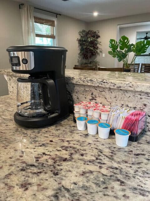 Drip coffee maker with coffee and creamer 