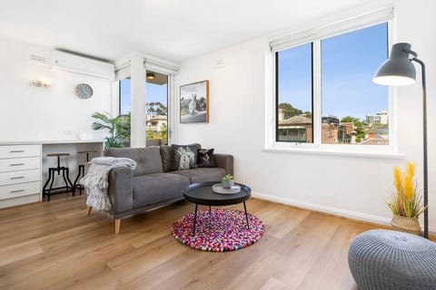 Sunny, stylish, and cosy — this bright living space offers city views, modern comforts, and a relaxing vibe perfect for your stay