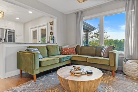 Living room with big bay window over the lake.