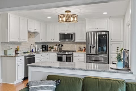 Plenty of serving room with the bar island top that connects to the entertainment areas.