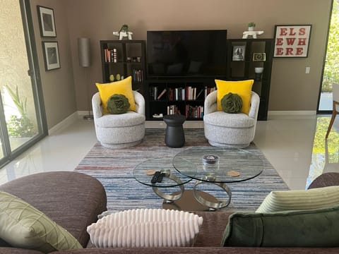 New West Elm swivel chairs and coffee table March 2025
