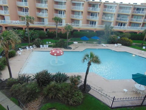View to the pool from top floor balcony