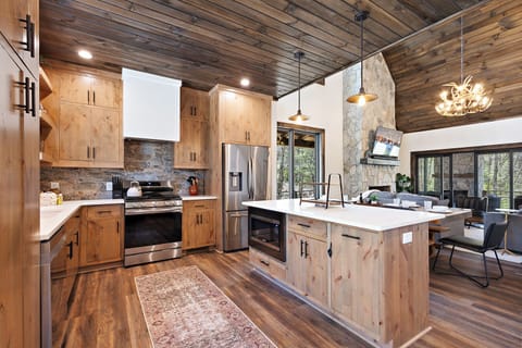 Stainless Appliances and Kitchen Island with Bar Seating