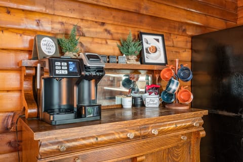 Coffee bar features a 2-in-one coffee maker + Keurig and a grinder. BYO coffee.